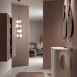 Ring round mirror with a painted metal frame and a black leather-effect hanging strap  - Ideagroup