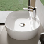 Sindy oval ceramic countertop washbasin  - Ideagroup